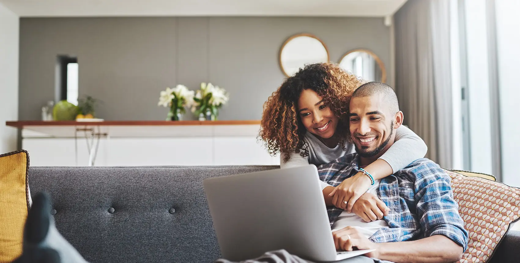 couple looking at a laptop together
