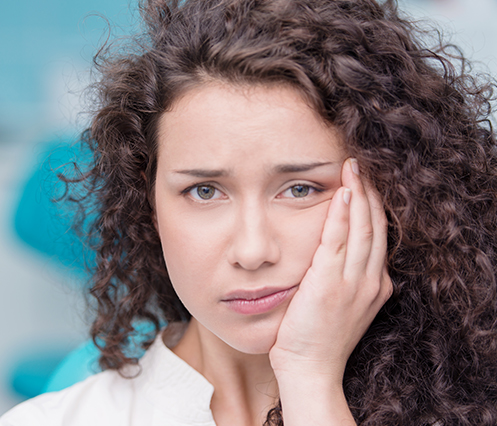 woman with tooth pain