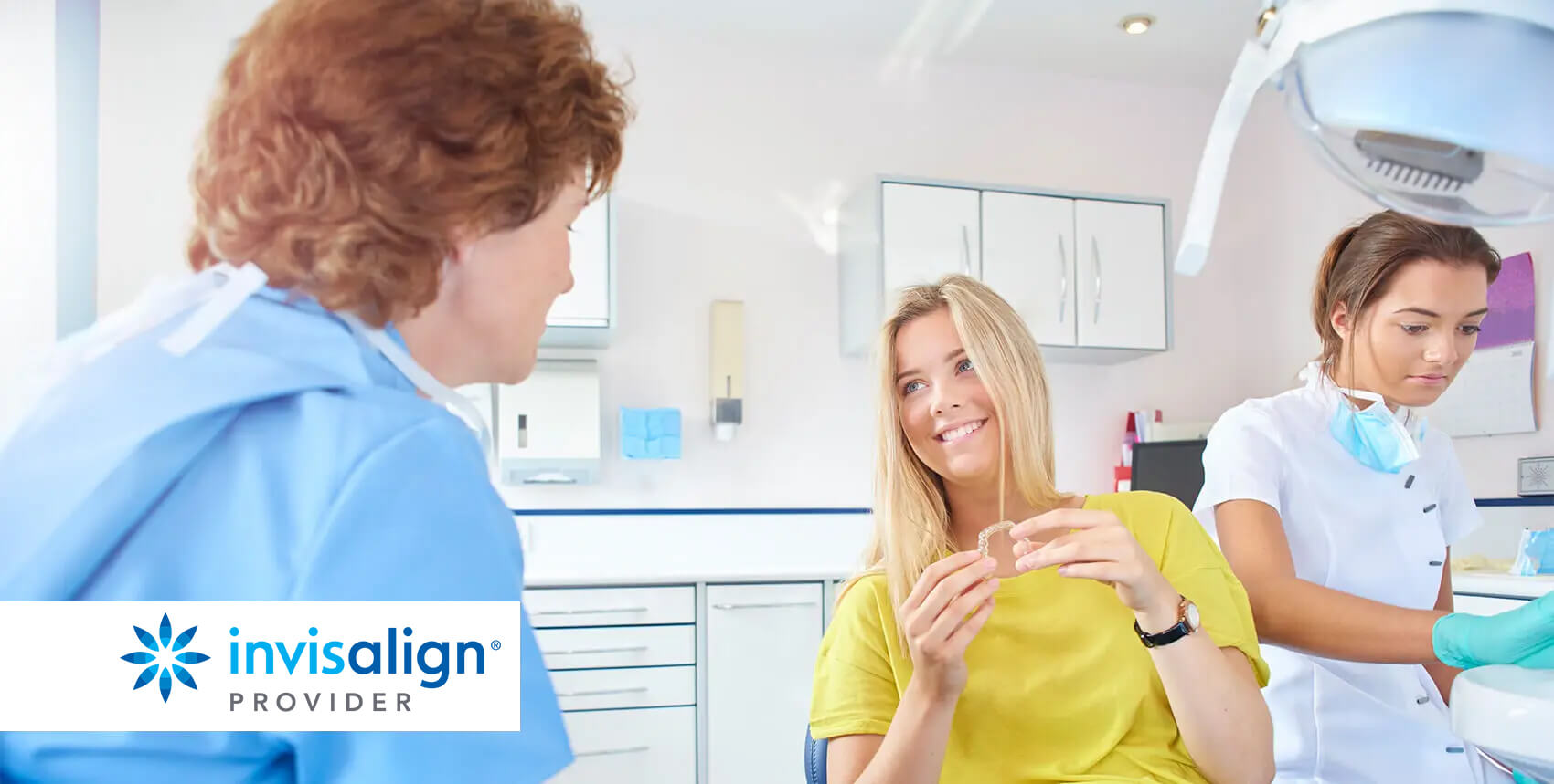 patient talking with her dentist about Invisalign